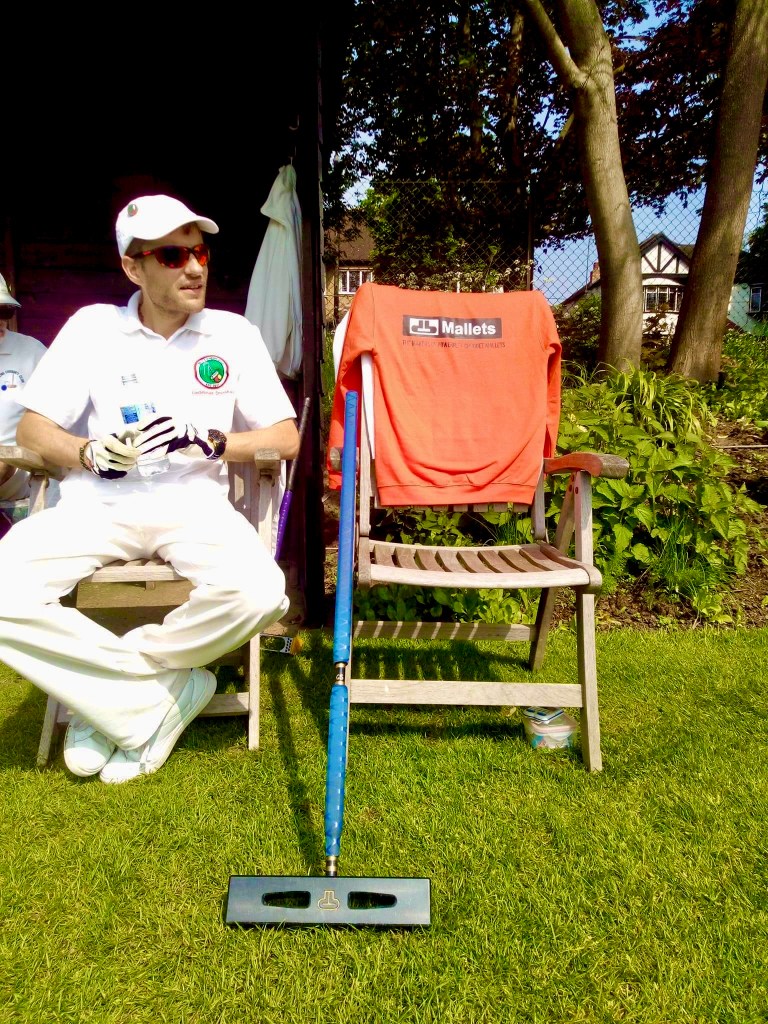 Taking a break and letting the croquet mallet cool down